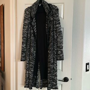 Free People black and white knit sweater coat.
Size s/p